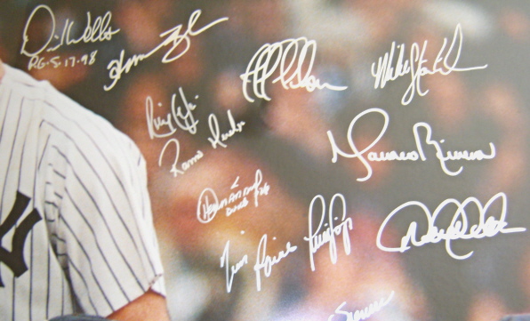 1998 New York Yankees Team Signed 30x40 Framed David Wells Perfect Game Photo, 23 Autographs ~ Close Up
This 30x40 inch photo was personally hand signed by the following 23 members of the 1998 World Champion New York Yankees: Homer Bush, Jose Cardenal, Chris Chambliss, Tony Cloninger, David Cone, Joe Girardi, Orlando Hernandez, Derek Jeter, Ricky Ledee, Tino Martinez, Ramiro Mendoza, Jeff Nelson, Paul Oï¿½Neill, Andy Pettitte, Tim Raines, Mariano Rivera, Luis Sojo, Shane Spencer, Mike Stanton, Mel Stottlemyre, Joe Torre, David Wells, and Bernie Williams. This awesome photo has been double matted and framed to 36x43 inches. The Photo is a hand numbered Limited Edition of only 25. The photo has a Goldin Sports Authenticity Hologram on it and comes with a Detailed Certificate of Authenticity (COA) from Real Deal Memorabilia, Inc
Keywords: Wells30x40-2