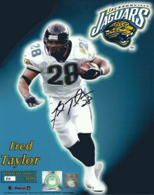 Fred Taylor Autographed Jaguars Limited 8x10 Photo
Running Back Fred Taylor was taken by the Jacksonville Jaguars in the 1st round of the 1998 draft.  Since then, Fred has gone on to set every Jaguars record possible.   Fred has hand-signed this Jaguars action 8x10 Photo. Limited Edition of 500.  This product comes complete with a Certificate of Authenticity from The REAL DEAL Memorabilia, Inc.  Accompanied by a photo of Fred at the signing and Fred's Exclusive Authenticity Hologram on the item!  Fred had an exclusive memorabilia contract with The REAL DEAL Memorabilia, so get the REAL DEAL!

Keywords: FT8x10JLTD