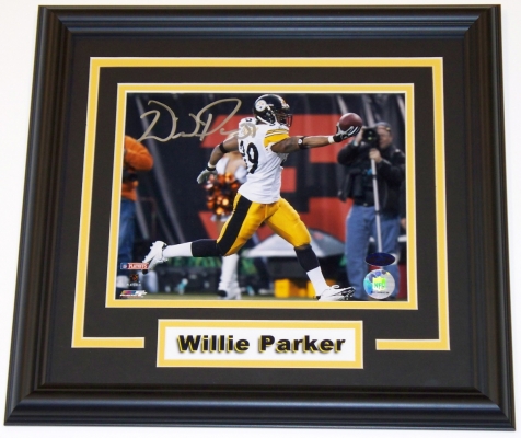Willie Parker Autographed Pittsburgh Steelers 8x10 Photo ~ Arm out TD ~ Custom Framed
Steelers running back, Willie Parker, has personally hand signed this Pittsburgh Steelers 8x10 photo with a silver sharpie pen.  The black wood frame measures 12x16 inches.  The double matting consists of a black top matting over a yellow bottom matting.  There is also a team colored nameplate centered below the autographed photo.  This custom made frame is ready to hang on the wall!  This autographed item is accompanied by a Photo of the athlete signing this type of item, an ENV Collectables Certificate of Authenticity (COA), and a matching  Authenticity Sticker on the signed item.  This fine item is brought to you by The REAL DEAL Memorabilia, Inc., get THE REAL DEAL!

Keywords: WP8x10ArmoutF