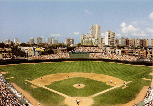 Wrigley Field (Chicago Cubs)
We offer three ways to display this image on your wall:
1. A 10x13 black wall plaque for $20, 
2. A 11x14 frame with double matting for $40.
3. A 16x20 custom frame with a gold nameplate, a team medallion, and double matting for $80.
Keywords: Wrigley Field Chicago Cubs photo
