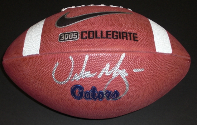 Urban Meyer Autographed Florida Gators Model Football ~ Same type of Ball that's used in Gator games!
2006 and 2008 National Championship Coach Urban Meyer has personally hand signed this full size Gators embossed Game Model Football with a Silver paint pen.   This is the EXACT same type of Ball that's used in the games, which are not sold in sotres and were only made available to Urban's Exclusive autograph agent!  This item comes with The REAL DEAL Memorabilia deluxe Authenticity, you will receive 1. A large photo of Urban signing our items, 2. a detailed Certificate of Authenticity, and 3.  Matching REAL DEAL Authenticity Holograms on all items!  Get THE REAL DEAL!
Keywords: UMFBGame
