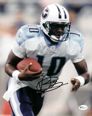 Vince Young Autographed Tennessee Titans 8x10 "Running" Photo
Vince Young has personally hand signed this 8x10 Photo with a Black sharpie pen.   This item comes with a numbered Online Authentics.com authenticity sticker on the autographed photo, which you can verify online once you purchase it at Online Authentics.com, which is one of the top third party authenticators in the memorabilia industry.  This item also comes with a REAL DEAL Memorabilia Certificate of Authenticity (COA).  Get The REAL DEAL.

Keywords: VY8x10running